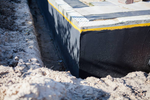 Professional Waterproofing technician working in Great Neck, NY